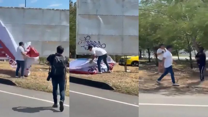 EN VIDEO: Hombre arrancó valla con recompensa de EEUU por Maduro y Cabello en autopista fronteriza de Colombia